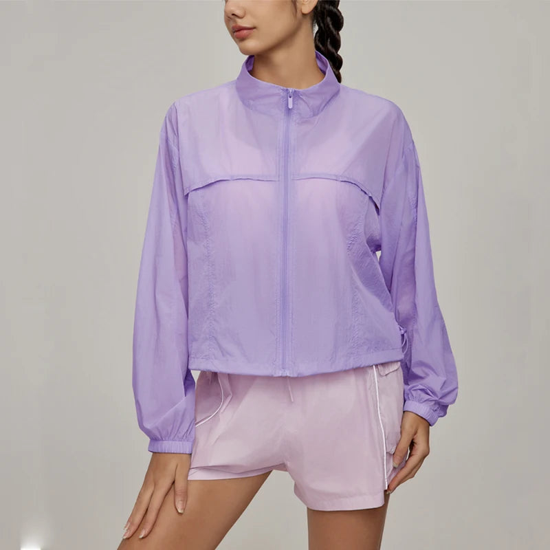 VITALINOVO Jaqueta esportiva feminina leve com zíper e gola à prova de vento para caminhada UPF 50 + camisas de corrida com proteção solar