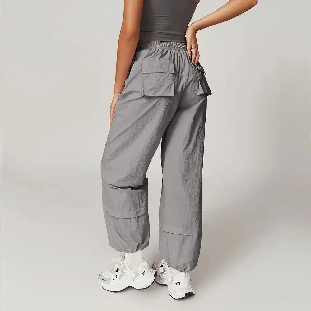 Calças de trabalho respiráveis à prova de vento calças de yoga femininas bolsos elásticos e soltos leggings correndo e calças esportivas casuais